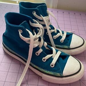 Converse high tops girls.  Tag says youth 1